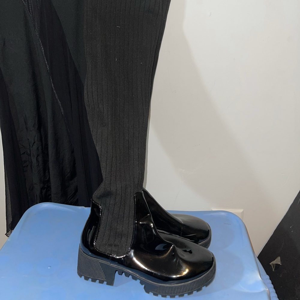 Black thigh high boot